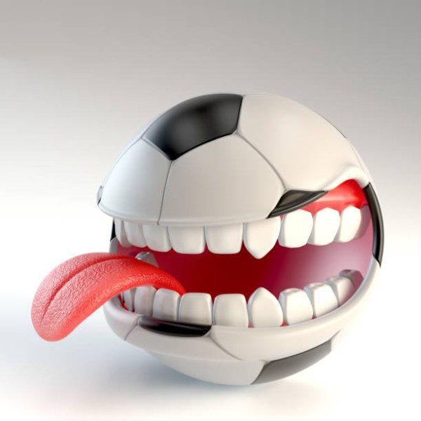 soccer ball with mouth over white background