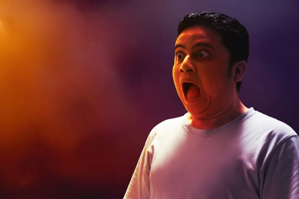 Portrait of young man scared