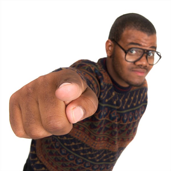 geeky teen pointing, small DOF focused on hand